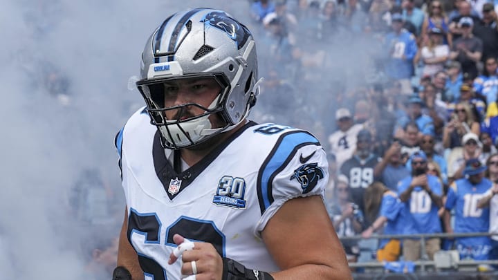Sep 15, 2024; Charlotte, North Carolina, USA; Carolina Panthers center Austin Corbett (63) takes the field against the Los Angeles Chargers during the first quarter at Bank of America Stadium. Mandatory Credit: Jim Dedmon-Imagn Images