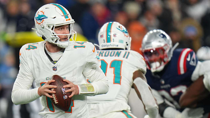 Miami Dolphins quarterback Quinn Ewers (14) drops back to pass against the New England Patriots during the second half at Gillette Stadium.