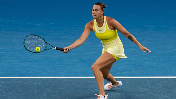 Jan 12, 2025; Melbourne, Victoria, Australia; Aryna Sabalenka hits a forehand during her match against Sloane Stephens of United States of America in the first round of the women's singles at the 2025 Australian Open at Melbourne Park. Mandatory Credit: Mike Frey-Imagn Images