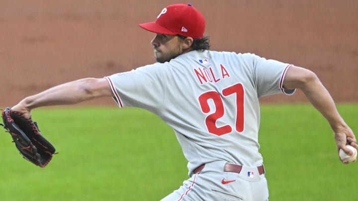 May 9, 2025; Cleveland, Ohio, USA; Philadelphia Phillies starting pitcher Aaron Nola (27) delivers a pitch in the first inning against the Cleveland Guardians at Progressive Field.
