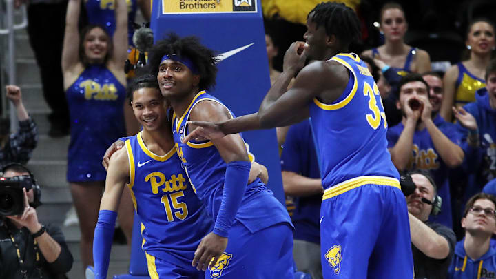 Feb 17, 2024; Pittsburgh, Pennsylvania, USA;  Pittsburgh Panthers guard Jaland Lowe (15) and guard Blake Hinson celebrate. 