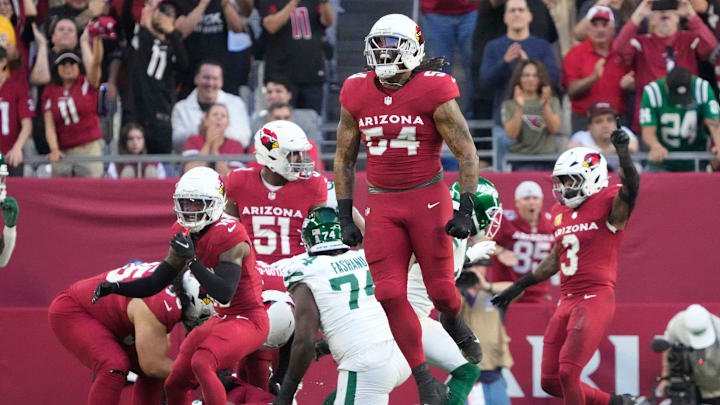 Arizona Cardinals linebacker Xavier Thomas (54) celebrates a fourth down stop and fumble recovery against the New York Jets during the third quarter at State Farm Stadium.