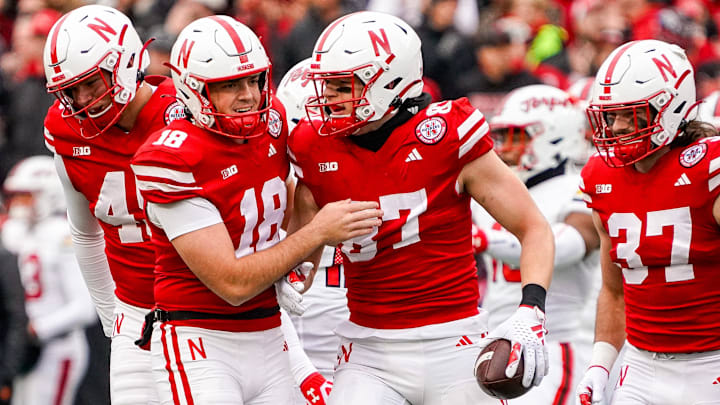 Nov 11, 2023; Lincoln, Nebraska, USA; Nebraska Cornhuskers punter Brian Buschini (18) and tight end Nate Boerkircher (87) celebrate after a first down on a fake punt against the Maryland Terrapins during the first quarter at Memorial Stadium. Mandatory Credit: Dylan Widger-Imagn Images Nov 11, 2023; Lincoln, Nebraska, USA; Nebraska Cornhuskers punter Brian Buschini (18) and tight end Nate Boerkircher (87) celebrate after a first down on a fake punt against the Maryland Terrapins during the first quarter at Memorial Stadium. Mandatory Credit: Dylan Widger-Imagn Images