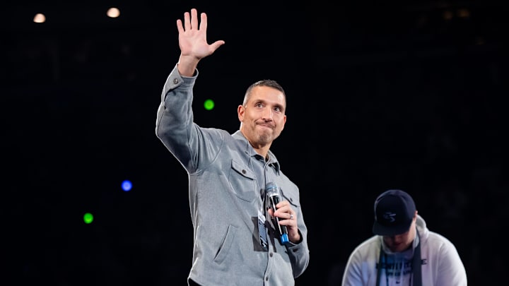 Penn State Nittany Lions football coach Matt Campbell waves to the crowd during a Big Ten wrestling match against Nebraska.
