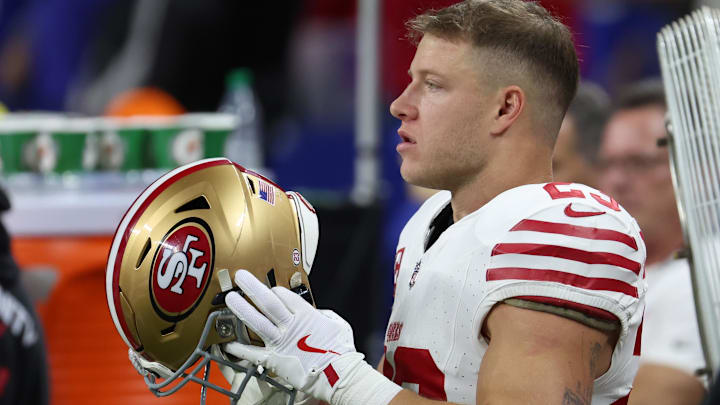 Dec 22, 2025; Indianapolis, Indiana, USA; San Francisco 49ers running back Christian McCaffrey (23) looks on before the game against the Indianapolis Colts at Lucas Oil Stadium.
