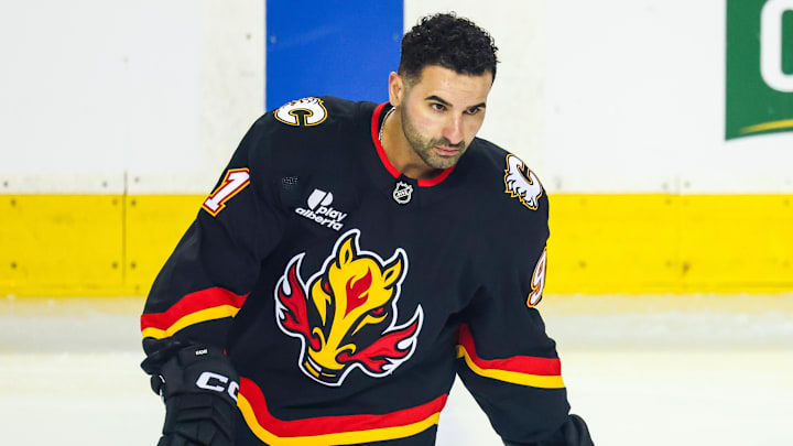 Mar 3, 2026; Calgary, Alberta, CAN; Calgary Flames center Nazem Kadri (91) skates during the warmup period against the Dallas Stars at Scotiabank Saddledome. Mandatory Credit: Sergei Belski-Imagn Images