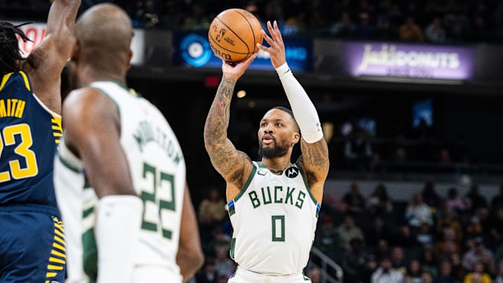 Milwaukee Bucks guard Damian Lillard (0)  shoots the ball.