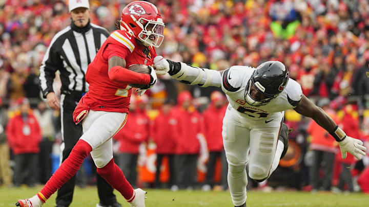 Jan 18, 2025; Kansas City, Missouri, USA; Houston Texans defensive end Will Anderson Jr. (51) drags down Kansas City Chiefs wide receiver Xavier Worthy (1) during the first quarter of a 2025 AFC divisional round game at GEHA Field at Arrowhead Stadium. Mandatory Credit: Jay Biggerstaff-Imagn Images