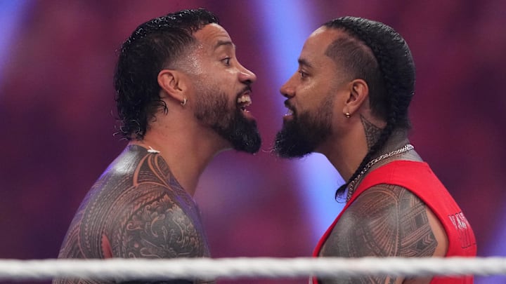 Jan 27, 2024; St. Petersburg, FL, USA; Jey Uso (left) and Jimmy Uso face off during the Men   s Royal Rumble match at Tropicana Field. Mandatory Credit: Joe Camporeale-Imagn Images