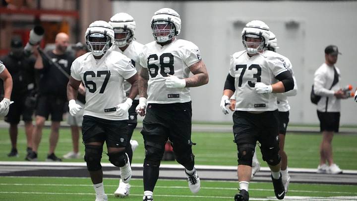 Jul 31, 2023; Henderson, NV, USA; Las Vegas Raiders offensive tackle Justin Murray (67), center Andre James (68) and guard Vitaliy Gurman (73) wear Guardian helmet caps during training camp at the Intermountain Health Performance Center. Mandatory Credit: Kirby Lee-USA TODAY Sports Jul 31, 2023; Henderson, NV, USA; Las Vegas Raiders offensive tackle Justin Murray (67), center Andre James (68) and guard Vitaliy Gurman (73) wear Guardian helmet caps during training camp at the Intermountain Health Performance Center. Mandatory Credit: Kirby Lee-USA TODAY Sports