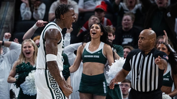 Mar 14, 2025; Indianapolis, IN, USA; Michigan State Spartans forward Coen Carr (55) celebrates a made basket in the second half against the Oregon Ducks  at Gainbridge Fieldhouse. Mandatory Credit: Trevor Ruszkowski-Imagn Images
