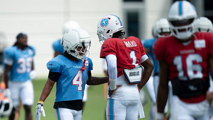 Tennessee Titans wide receiver Wan’Dale Robinson (4) and quarterback Cam Ward talk after individual drills during minicamp at Vanderbilt Health Football Center Tuesday, Aug. 4, 2026. Tennessee Titans wide receiver Wan’Dale Robinson (4) and quarterback Cam Ward talk after individual drills during minicamp at Vanderbilt Health Football Center Tuesday, Aug. 4, 2026.