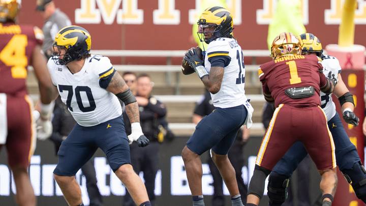 Oct 3, 2026; Minneapolis, Minnesota, USA;  Michigan Wolverines quarterback Bryce Underwood (19) steps back to pass against the Minnesota Golden Gophers in the fourth quarter at Huntington Bank Stadium.  Mandatory Credit: Matt Blewett-Imagn Images