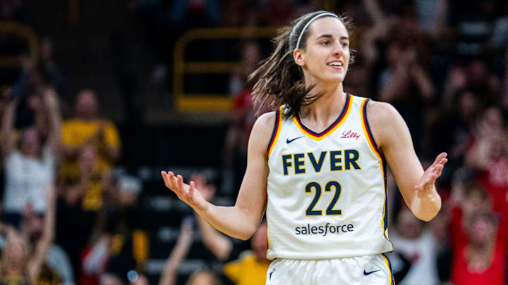 Indiana Fever guard Caitlin Clark (22) questions an official Sunday, May 4, 2025, during a preseason game between the Indiana Fever and the Brazil national team at Carver-Hawkeye Arena in Iowa City.