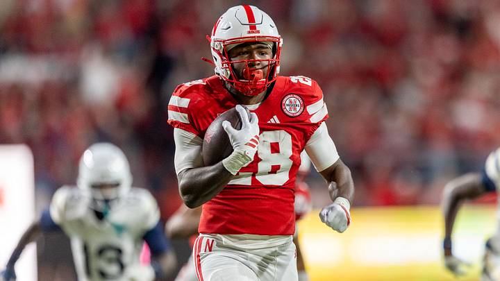 Kwinten Ives runs 28 yards for a touchdown against Akron last season.
