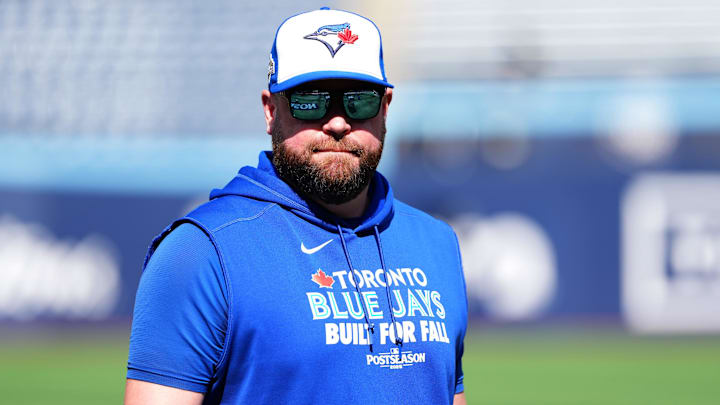 Oct 4, 2025; Toronto, Ontario, CAN; Toronto Blue Jays manager John Schneider (14) before game one against the New York Yankees in the ALDS round for the 2025 MLB playoffs at Rogers Centre. 