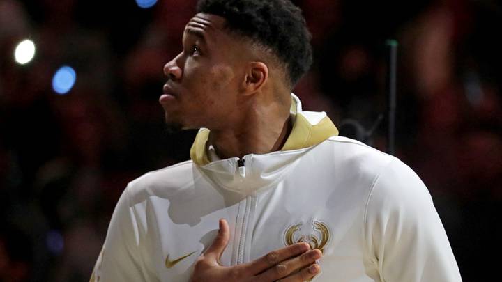 Oct. 19, 2021; Milwaukee, WI, USA; Milwaukee Bucks forward Giannis Antetokounmpo (34) watches as the the Milwaukee Bucks' 2021 championship banner is unveiled with his Championship ring during Milwaukee Bucks ring ceremony; Mand atory credit: Mike De Sisti-USA TODAY NETWORK via Imagn Images
Oct. 19, 2021; Milwaukee, WI, USA; Milwaukee Bucks forward Giannis Antetokounmpo (34) watches as the the Milwaukee Bucks' 2021 championship banner is unveiled with his Championship ring during Milwaukee Bucks ring ceremony; Mand atory credit: Mike De Sisti-USA TODAY NETWORK via Imagn Images