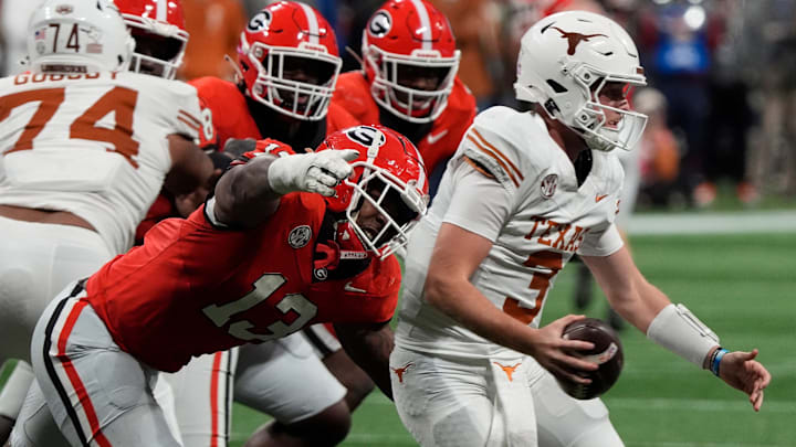 Georgia defensive lineman Mykel Williams goes in for a sack on Texas quarterback Quinn Ewers