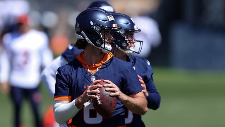 May 23, 2024; Englewood, CO, USA; Denver Broncos quarterback Jarrett Stidham (8) and quarterback Bo Nix (10) during organized team activities at Centura Health Training Center. 