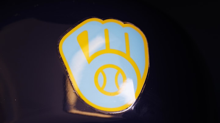 Jun 18, 2023; Milwaukee, Wisconsin, USA; A Milwaukee Brewers logo on a batting helmet in the dugout prior to the game against the Pittsburgh Pirates at American Family Field. Mandatory Credit: Jeff Hanisch-Imagn Images Jun 18, 2023; Milwaukee, Wisconsin, USA; A Milwaukee Brewers logo on a batting helmet in the dugout prior to the game against the Pittsburgh Pirates at American Family Field. Mandatory Credit: Jeff Hanisch-Imagn Images