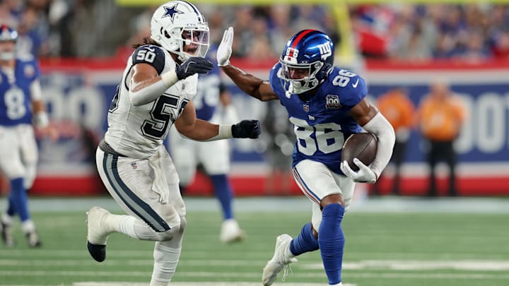New York Giants wide receiver Darius Slayton runs with the ball against Dallas Cowboys linebacker Eric Kendricks 