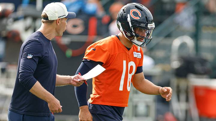 Chicago Bears head coach Ben Johnson talks to quarterback Caleb Williams (18) during Training Camp at Halas Hall. Mandatory Credit: Kamil Krzaczynski-Imagn Images