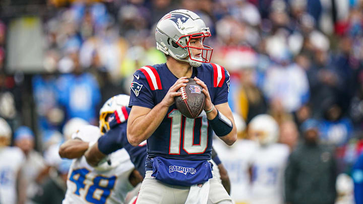 Dec 28, 2024; Foxborough, Massachusetts, USA; New England Patriots quarterback Drake Maye (10) looks to pass the ball against the Los Angeles Chargers in the first half at Gillette Stadium.