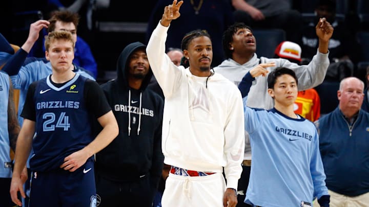 Nov 20, 2024; Memphis, Tennessee, USA; Memphis Grizzlies guard Cam Spencer (24), guard Marcus Smart (36), guard Ja Morant (12), forward GG Jackson II (45) and  guard Yuki Kawamura (17) react from the bench during the second half against the  Philadelphia 76ers  at FedExForum. Mandatory Credit: Petre Thomas-Imagn Images