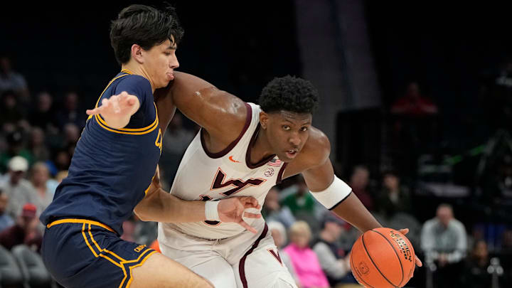 Mar 11, 2025; Virginia Tech guard Tyler Johnson (10) with the ball as California Golden Bears guard Andrej Stojakovic (2) defends. Mar 11, 2025; Virginia Tech guard Tyler Johnson (10) with the ball as California Golden Bears guard Andrej Stojakovic (2) defends.