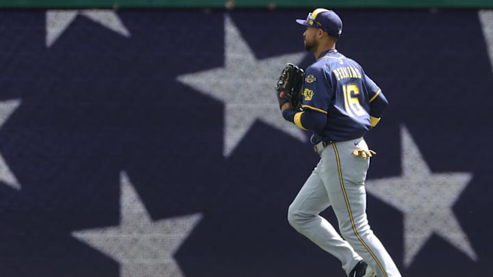 Sep 7, 2025; Pittsburgh, Pennsylvania, USA;  Milwaukee Brewers  center fielder Blake Perkins (16) jogs out to his position for the bottom of the third inning against the Pittsburgh Pirates at PNC Park. Mandatory Credit: Charles LeClaire-Imagn Images
