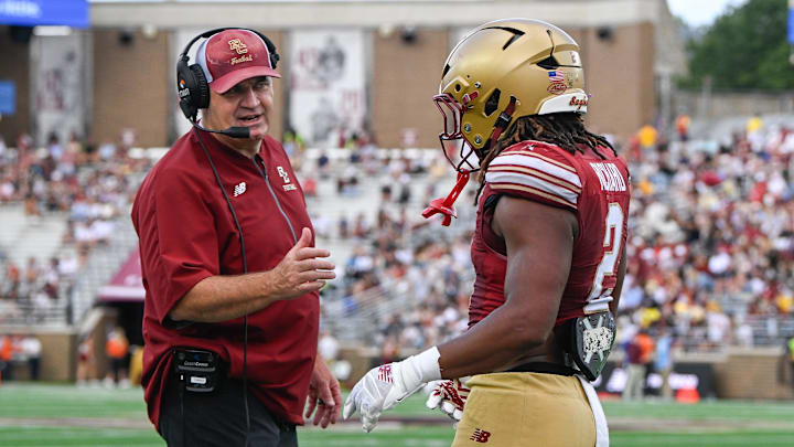 Aug 30, 2025; Chestnut Hill, Massachusetts, USA; Boston College Eagles head coach Bill O'Brien congratulates running back Turbo Richard (2) on his touchdown against the Fordham Rams during the second half at Alumni Stadium. Mandatory Credit: Eric Canha-Imagn Images Aug 30, 2025; Chestnut Hill, Massachusetts, USA; Boston College Eagles head coach Bill O'Brien congratulates running back Turbo Richard (2) on his touchdown against the Fordham Rams during the second half at Alumni Stadium. Mandatory Credit: Eric Canha-Imagn Images