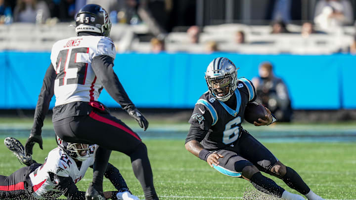 Dec 12, 2021; Charlotte, North Carolina, USA; Carolina Panthers quarterback P.J. Walker (6) tries to