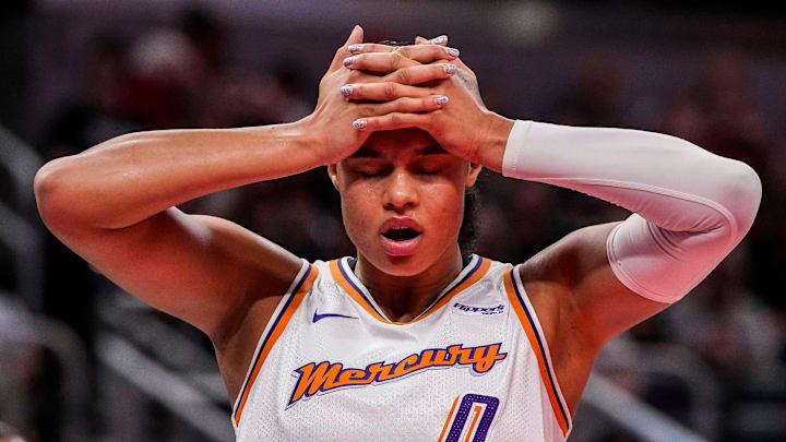 Phoenix Mercury forward Satou Sabally (0) holds her head Wednesday, July 30, 2025, during the game at Gainbridge Fieldhouse in Indianapolis. The Indiana Fever defeated the Phoenix Mercury, 107-101.