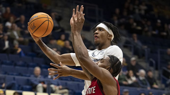 Cal's Jeremiah Wilkinson drives to the basket. Cal's Jeremiah Wilkinson drives to the basket.