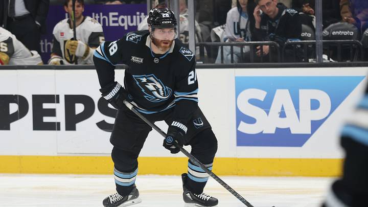Apr 27, 2026; Salt Lake City, Utah, USA; Utah Mammoth defenseman Ian Cole (28) plays the puck against the Vegas Golden Knights during the third period in game four of the first round of the 2026 Stanley Cup Playoffs at Delta Center. Mandatory Credit: Rob Gray-Imagn Images