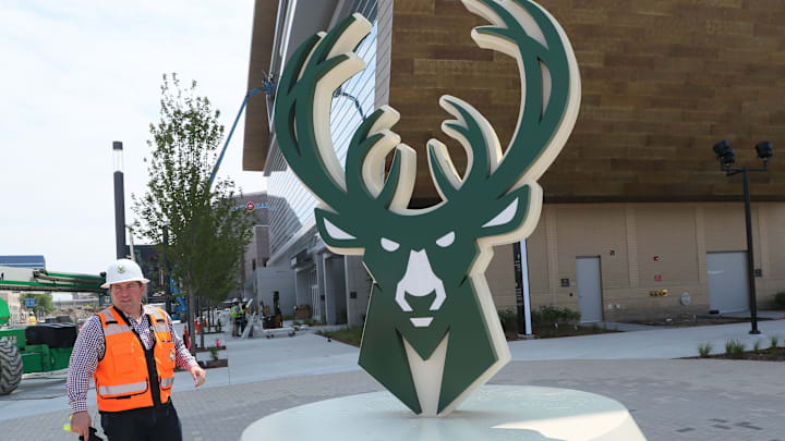 Bucks President Peter Feigin with an illuminated Deer logo sign outside the new Fiserv Forum June 27, 2018.