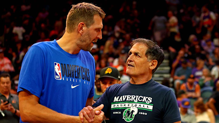 May 15, 2022; Phoenix, Arizona, USA; Dallas Mavericks former player Dirk Nowitzki greats Dallas Mavericks owner Mark Cuban during the second quarter in game seven of the second round for the 2022 NBA playoffs between the Dallas Mavericks and the Phoenix Suns at Footprint Center. Mandatory Credit: Mark J. Rebilas-Imagn Images May 15, 2022; Phoenix, Arizona, USA; Dallas Mavericks former player Dirk Nowitzki greats Dallas Mavericks owner Mark Cuban during the second quarter in game seven of the second round for the 2022 NBA playoffs between the Dallas Mavericks and the Phoenix Suns at Footprint Center. Mandatory Credit: Mark J. Rebilas-Imagn Images