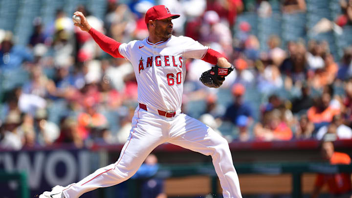 Jun 22, 2025; Anaheim, California, USA; Los Angeles Angels pitcher Hunter Strickland (60) throws against the Houston Astros during the sixth inning at Angel Stadium. Mandatory Credit: Gary A. Vasquez-Imagn Images