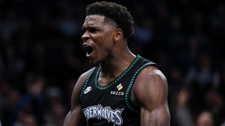 Nov 30, 2025; Minneapolis, Minnesota, USA; Minnesota Timberwolves guard Anthony Edwards (5) celebrates his basket against the San Antonio Spurs during the second half at Target Center.