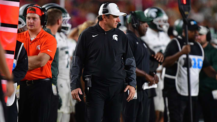 Sep 20, 2025; Los Angeles, California, USA; Michigan State Spartans head coach Jonathan Smith watches game action against the Southern California Trojans during the second half at the Los Angeles Memorial Coliseum. Mandatory Credit: Gary A. Vasquez-Imagn Images