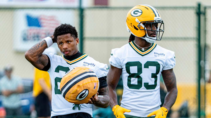 Green Bay Packers wide receiver Matthew Golden (22) and wide receiver Savion Williams (83) prepare to run a drill during the second day of training camp on Thursday, July 24, 2025, at Ray Nitschke Field in Ashwaubenon, Wis.