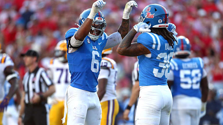 Sep 27, 2025; Oxford, Mississippi, USA; Mississippi Rebels linebacker TJ Dottery (6) and linebacker Jaden Yates (30) react during the fourth quarter against the LSU Tigers at Vaught-Hemingway Stadium. Mandatory Credit: Petre Thomas-Imagn Images Sep 27, 2025; Oxford, Mississippi, USA; Mississippi Rebels linebacker TJ Dottery (6) and linebacker Jaden Yates (30) react during the fourth quarter against the LSU Tigers at Vaught-Hemingway Stadium. Mandatory Credit: Petre Thomas-Imagn Images
