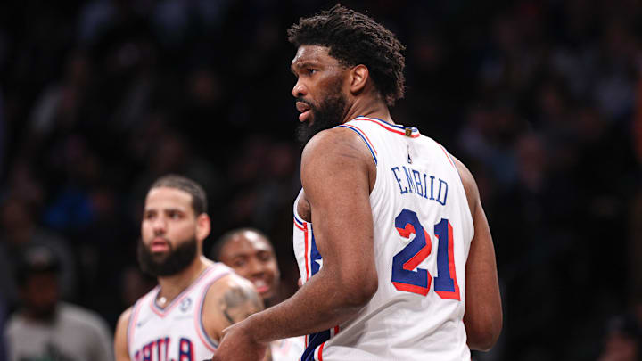 Jan 4, 2025; Brooklyn, New York, USA; Philadelphia 76ers center Joel Embiid (21) looks back during the first half against the Brooklyn Nets at Barclays Center. Mandatory Credit: Vincent Carchietta-Imagn Images