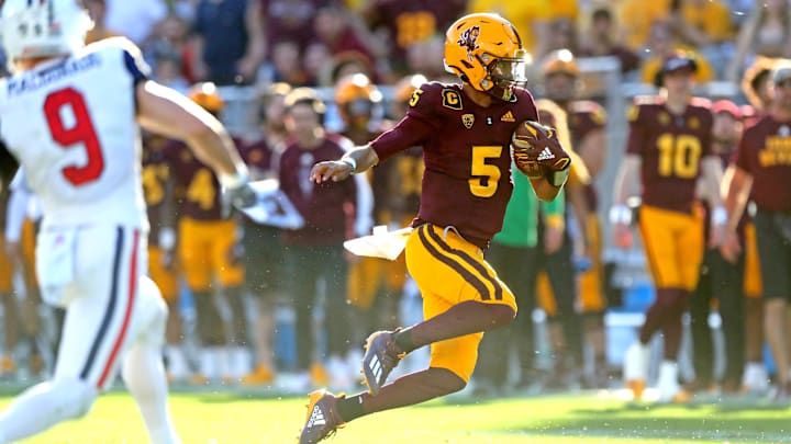 Nov 27, 2021; Tempe, Arizona, USA; Arizona State Sun Devils quarterback Jayden Daniels (5) runs the ball during the second half against the Arizona Wildcats at Sun Devil Stadium. Mandatory Credit: Mark J. Rebilas-Imagn Images