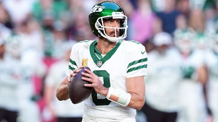 Nov 10, 2024; Glendale, Arizona, USA; New York Jets quarterback Aaron Rodgers (8) passes against the Arizona Cardinals during the second half at State Farm Stadium. Nov 10, 2024; Glendale, Arizona, USA; New York Jets quarterback Aaron Rodgers (8) passes against the Arizona Cardinals during the second half at State Farm Stadium.