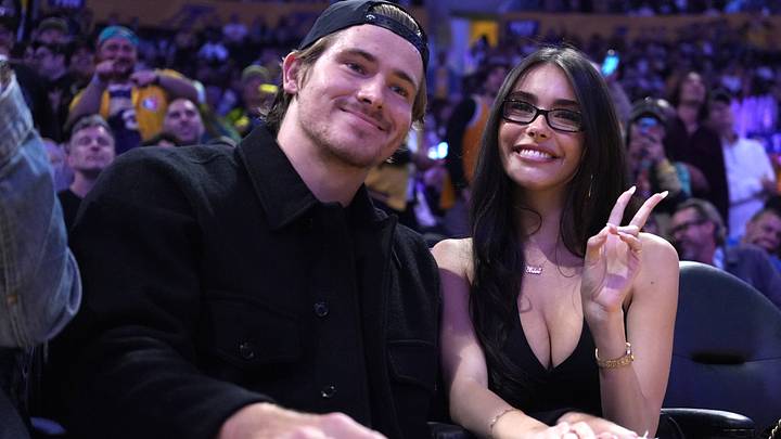 Oct 24, 2025; Los Angeles, California, USA; Los Angeles Chargers quarterback Justin Herbert (left) and girlfriend Madison Beer attend the game between the Minnesota Timberwolves and the Los Angeles Lakers at Crypto.com Arena. Oct 24, 2025; Los Angeles, California, USA; Los Angeles Chargers quarterback Justin Herbert (left) and girlfriend Madison Beer attend the game between the Minnesota Timberwolves and the Los Angeles Lakers at Crypto.com Arena.