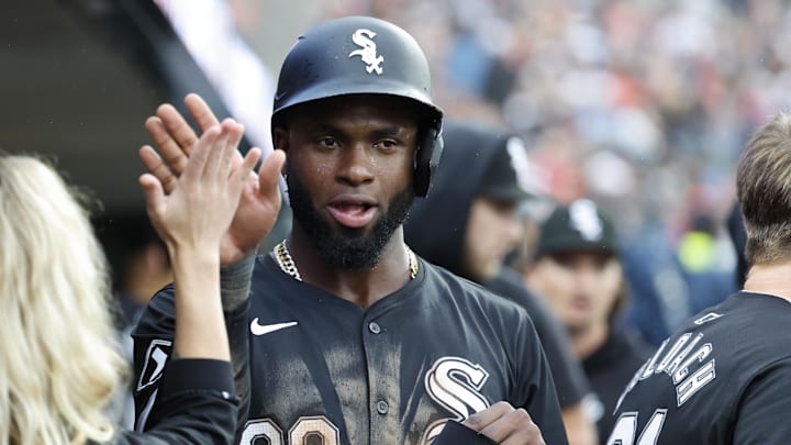 Sep 29, 2024; Detroit, Michigan, USA; Chicago White Sox center fielder Luis Robert Jr. (88) receives congratulations from teammates after scoring in the seventh inning against the Detroit Tigers at Comerica Park. Sep 29, 2024; Detroit, Michigan, USA; Chicago White Sox center fielder Luis Robert Jr. (88) receives congratulations from teammates after scoring in the seventh inning against the Detroit Tigers at Comerica Park.