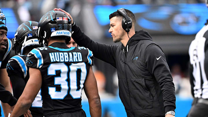 Carolina Panthers head coach Dave Canales with running back Chuba Hubbard