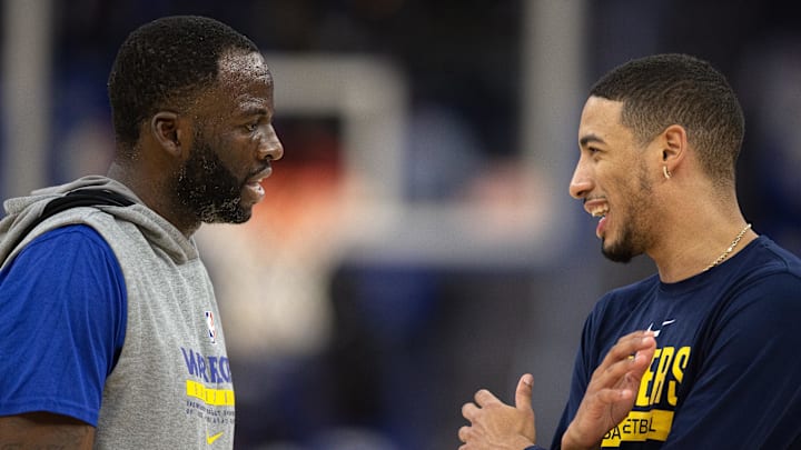 Dec 5, 2022; San Francisco, California, USA; Golden State Warriors forward Draymond Green (23) and Indiana Pacers guard Tyrese Haliburton (0) chat before a game at Chase Center. Mandatory Credit: D. Ross Cameron-Imagn Images