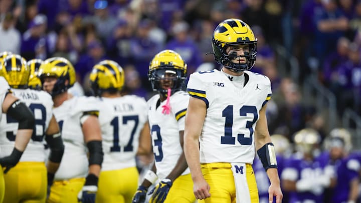 Oct 5, 2024; Seattle, Washington, USA; Michigan Wolverines quarterback Jack Tuttle (13) waits for a play to come in against the Washington Huskies during the third quarter at Alaska Airlines Field at Husky Stadium. Mandatory Credit: Joe Nicholson-Imagn Images